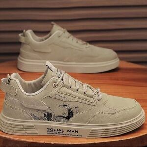 tan high-top sneakers with "YUAN PAI" and "SOCIAL MAN"